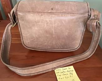 H47 - $110. 1970s Coach Tan USA Leather Messenger Flap Pouch Bag. Measures 10" wide x 4" deep x 9" tall. 