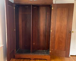 H3 - $250. Antique Wardrobe. Measures 49" wide x 17" deep x 80" tall. No bars / Shelves inside. Beautiful piece that just needs a little TLC. 