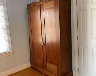 H3 - $250. Antique Wardrobe. Measures 49" wide x 17" deep x 80" tall. No bars / Shelves inside. Beautiful piece that just needs a little TLC. 