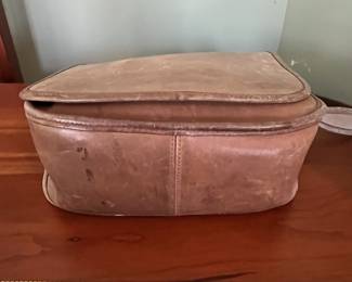 H47 - $110. 1970s Coach Tan USA Leather Messenger Flap Pouch Bag. Measures 10" wide x 4" deep x 9" tall. 