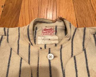 H12 - $175. Childs Wool Baseball Uniform. "White Rose Flour" was the sponsor. Some staining but no holes that I noticed. 