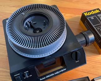 H42 - $60. Kodak Carousel 4400 Slide Projector. 2 slide trays, case & remote. Works well!