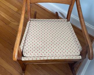 H17 - $75. Antique Wooden Rocking Chair. Overall very good condition - rocks very smoothly.  Measures 21" wide x 33" deep x 38" tall. Upholstered Cushion is in very good condition as well!