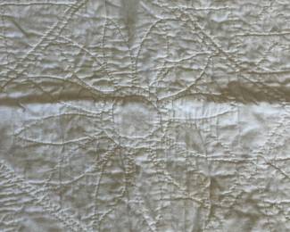 H51 - $30. Hand Quilted Blanket. Measures 60" x 75". Does have a small ink stains, small holes & discoloration throughout.  