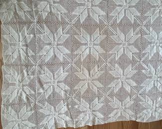 H54 - $45. Crocheted Coverlet. Measures 70" x 98". Not discolored - 2 shades of yarn were used.  