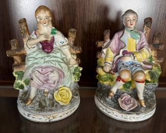 Colonial man woman figurines 