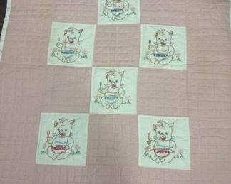 Hand stitched Pink baby quilt with embroidered pigs
