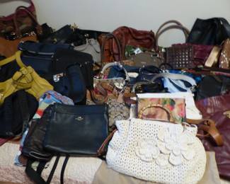 Lots of handbags including Michael Kors, Coach and more brands