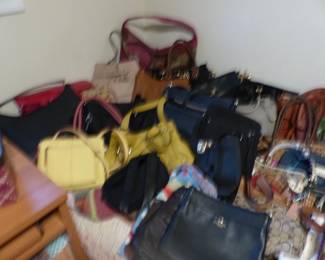 Lots of handbags including Michael Kors, Coach and more brands
