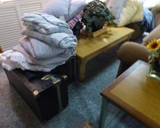 Coffee table, linens, trunk