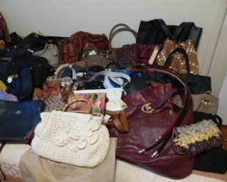 Lots of handbags including Michael Kors, Coach and more brands