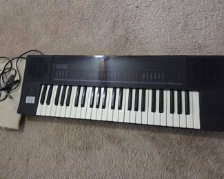 Lowrey Micro Genie V-100 Electronic Keyboard