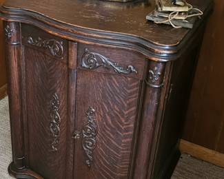 beautifully carved antique cabinet