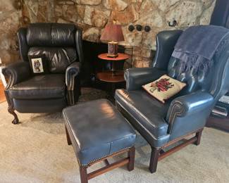 Two Chesterfield chairs, one with ottoman