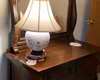 Wooden Chest Of Drawers On Casters With Mirror And Lamp 