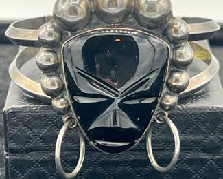 Vintage Vaughn's Mexican sterling silver bracelet featuring a carved black onyx tribal mask
