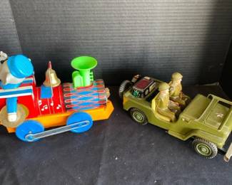Two Vintage Battery Operated Metal Toys