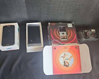 Samsung Phones, Kodak Playfull Video Camera And A Cannon Sure Shot