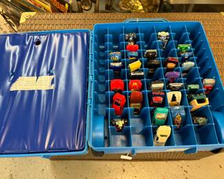 I know this is not furniture but wow is this fun.   Hot Wheels pull tote and 28 cars!  I could not resist!