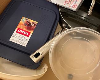 tons of kitchen utensils, pots and pans, etc