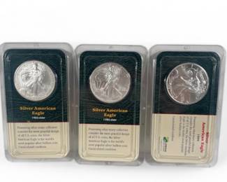 Three Silver American Eagle Dollars (2)1986 (1) 1999