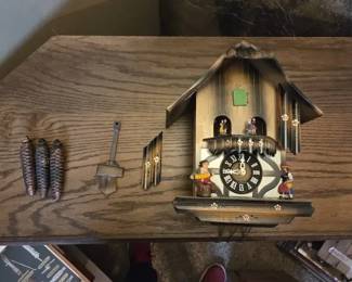 Traditional Black ForestStyle Cuckoo Clock with Pinecone Weights
