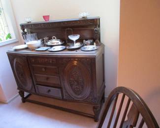 Antique ornately carved sideboard