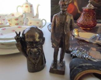 Vintage Nixon and Lincoln metal statues