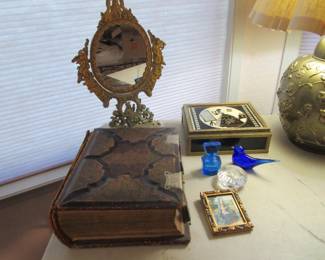 Antique bronze mirror, antique bible, antique postcard box