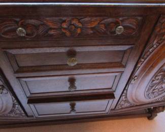 Close up of carved sideboard