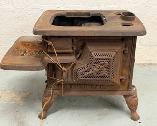 ANTIQUE CHARTER OAK CAST IRON TOY STOVE & PARTS