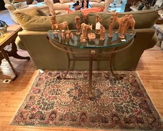 Wool rug, carved nativity set