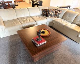 Ivory leather sectional and large square wood cocktail/coffee table