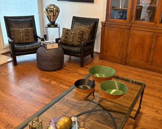 Pair of black leather armchairs, Jute ottoman, ART - Pottery and framed print along with coffee metal and glass coffee table