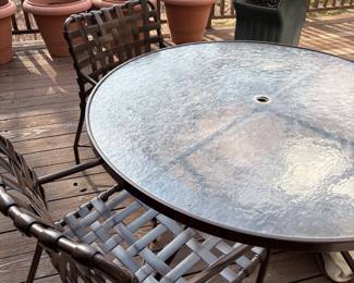 Tropitone patio table with 4 armchairs and cast aluminum portable grill