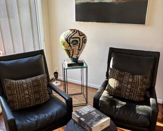Pair of leather armchairs, jute ottoman, ART - pottery on stand, and MORE