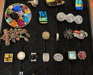 Costume jewelry- rings and lapel pins - some sterling 