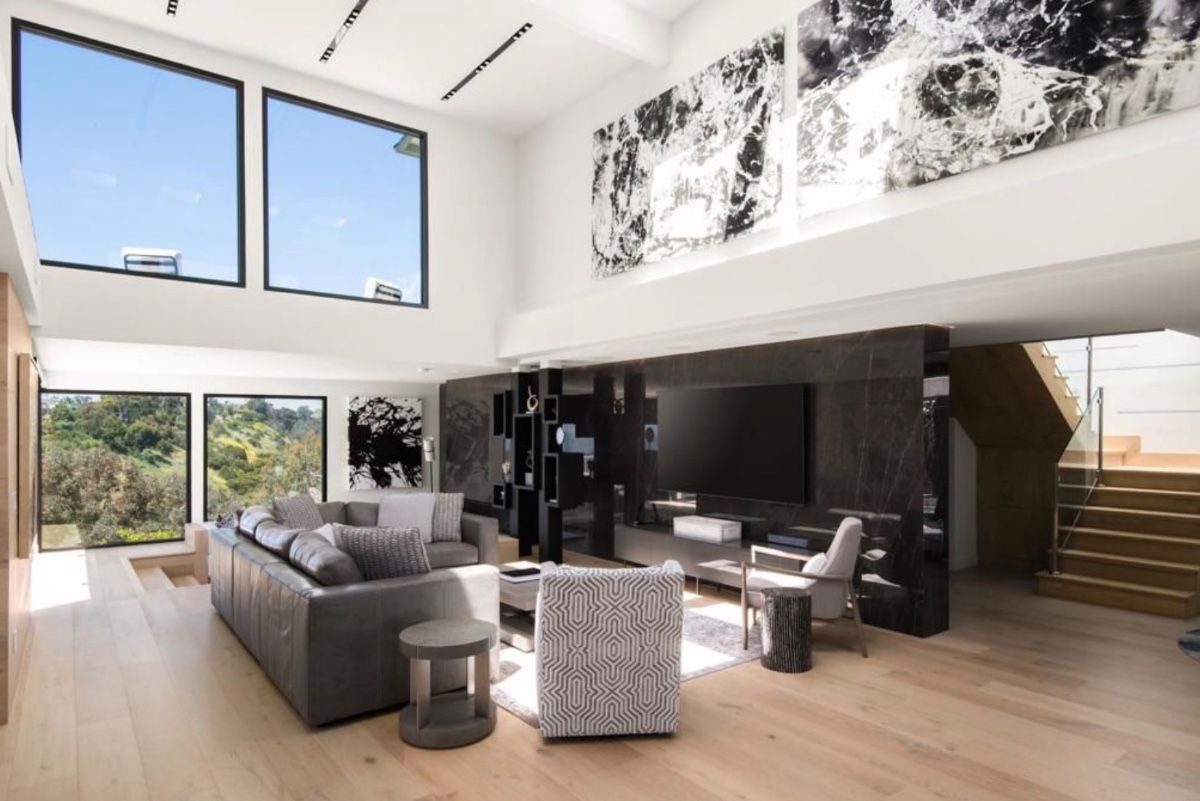 Leather sectional, coffee table, side chairs, 85" flatscreen TV Samsung