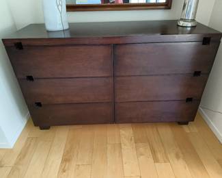 Dark wood 6-drawer dresser.