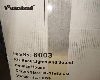 Bounceland bounce house. (Used once. In box.)