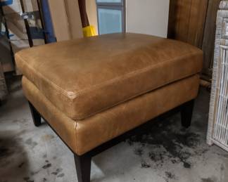 Tan leather square ottoman. High quality leather.