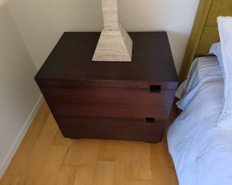Dark wood 2-drawer dresser.