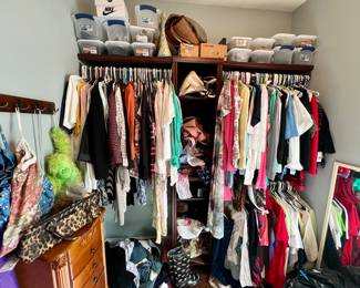 Lots of women's clothes (sz. M-XL), shoes (sz. 7-8), purses, scarves, costume jewelry, etc. 