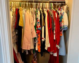 This closet is full off Holiday themed clothing, costumes & shoes.