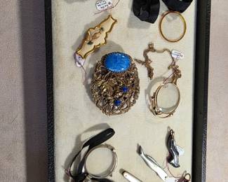 Sterling lorgnette, antique monocle, figurative pen knives, Victorian gutta percha locket
