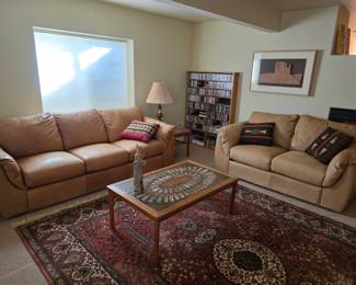 Lower level view - leather sofas, 1960's tile table, oriental rug