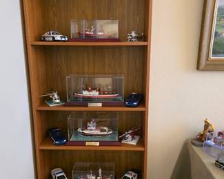 Part of hand painted models of rescue vehicles