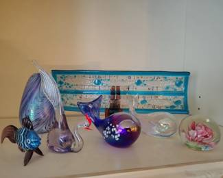 Assorted art glass paperweights.
