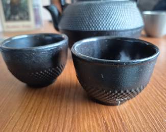 Cast iron tea pot and cups