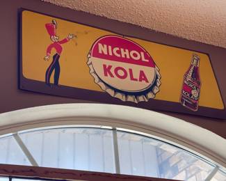 Nichol Kola Sign